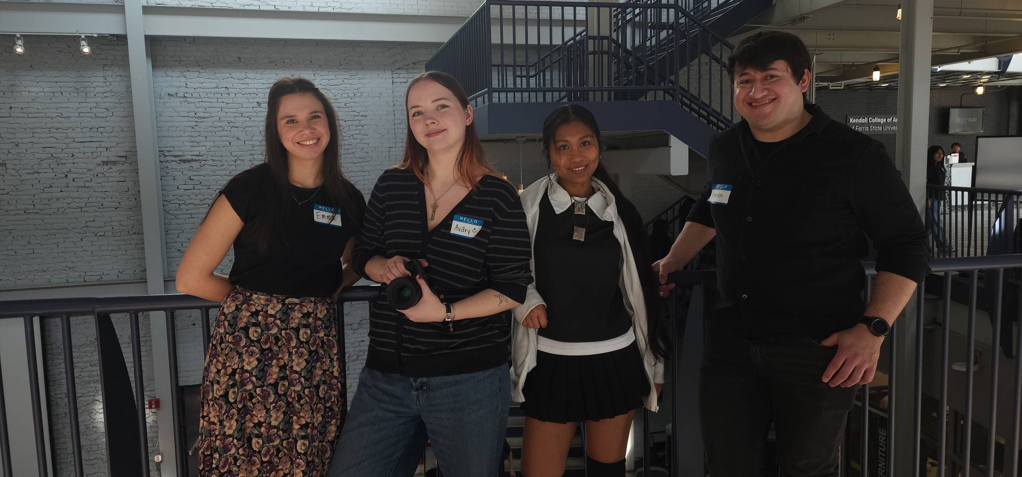 A group photo of four Project Grand Path interns, smiling.